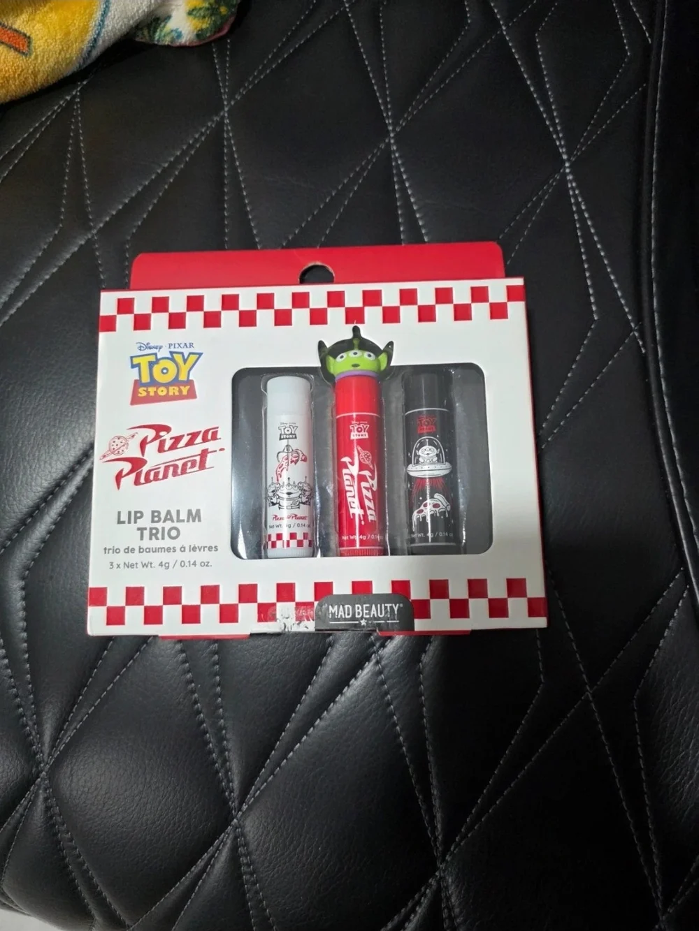 Disney Toy Story Pizza Planet Lip Balm Trio - Red, White, Black